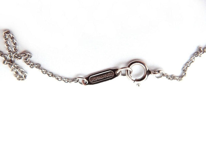 Collier collier tiffany victoria fleur pendante diamants platine 58 Facettes 259242