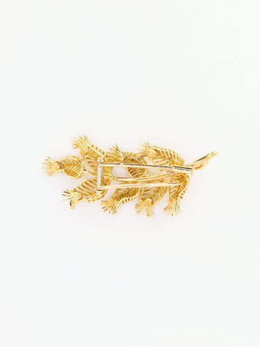 Broche GUBELIN Broche feuille or rubis émeraudes 58 Facettes 1126.1