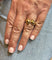 Bague Cartier - Bague Panthère or jaune émeraudes et onyx 58 Facettes
