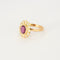 Bague 57 Bague marguerite or jaune, rubis et diamants 58 Facettes