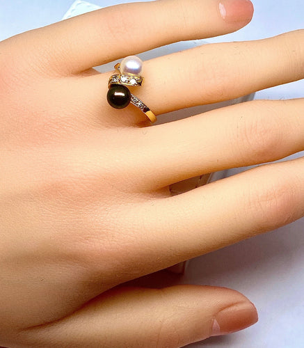Bague Bague en or jaune 18 carats, perle de Tahiti, perle de culture blanche et diamants 58 Facettes AB264