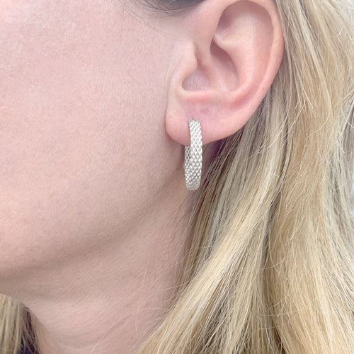 Boucles d'oreilles Créoles Tiffany & Co "Somerset" argent. 58 Facettes 34315