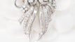 Broche Broche Art déco double clips en or blanc et platine, diamants 58 Facettes 32946