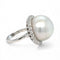 Bague 54 Bague rétro en or blanc avec perle des mers du Sud et diamant 58 Facettes