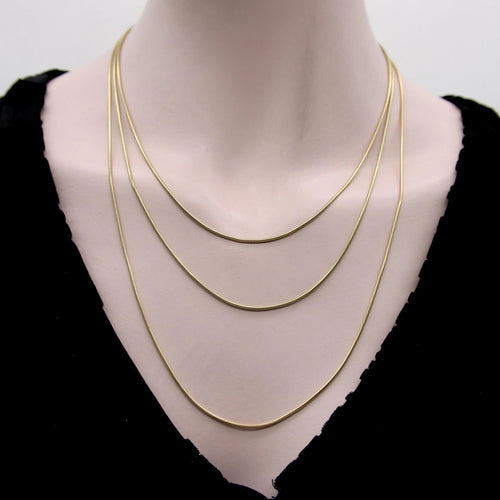 Collier Chaîne serpent vintage en or 14 carats de 24 pouces 58 Facettes A2000R