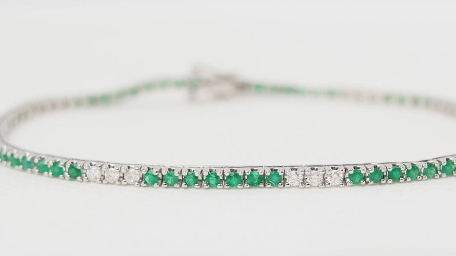 Bracelet Bracelet rivière en or blanc, émeraudes et diamants 58 Facettes 32238