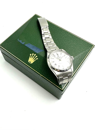 Montre ROLEX - Date réf. 1500 verre plexi 58 Facettes