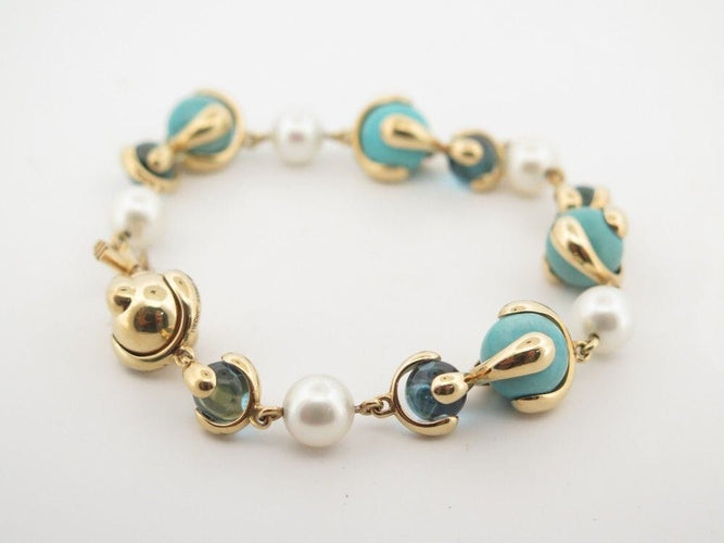 Bracelet bracelet MARINA B cardan or jaune et pierres turquoises 58 Facettes 259151