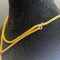 Collier Collier or jaune à coulisse et pompons 58 Facettes