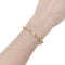 Collier Sautoir et bracelet Hermès, deux ors. 58 Facettes 33857/58