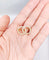 Broche Broche antique or jaune cercles infini et perles 58 Facettes A05616