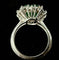 Bague 56 Bague or blanc sertie d'une émeraude de 4 carats entourée de 2,40 carats de brillants 58 Facettes