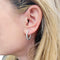 Boucles d'oreilles Paire de petites créoles en or blanc et diamants. 58 Facettes 34484