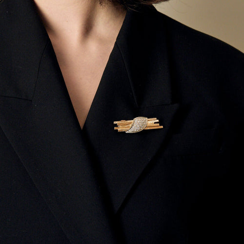 Broche Broche moderniste en or jaune, or blanc et diamants 58 Facettes AUX1261