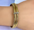 Bracelet Bracelet double joncs, or blanc, diamants, Yves Saint Laurent 58 Facettes AB601