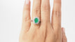Bague 55 Bague entourage en or blanc, émeraude ovale et diamants 58 Facettes 32326