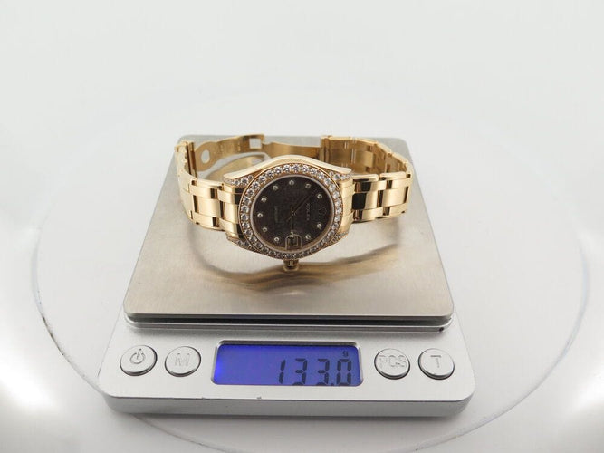 Montre montre ROLEX lady datejust plmaster 34mm or auto 58 Facettes 264425