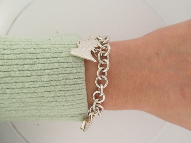 Bracelet bracelet TIFFANY & CO chaine a breloques charms tour eiffel en argent 58 Facettes 259081