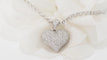Collier Collier pendentif coeur en or blanc et diamants 58 Facettes 31370
