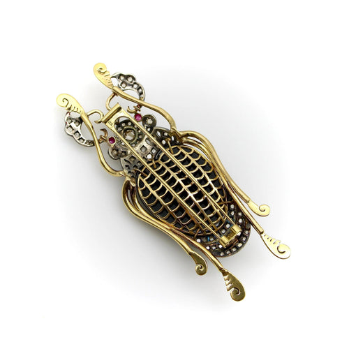 Broche Broche scarabée en or et argent avec diamants, onyx et rubis 58 Facettes