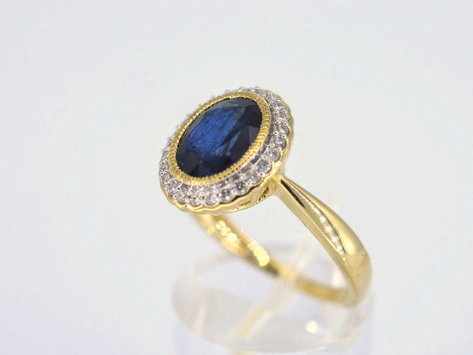 Bague 54 Bague entourage en or avec diamants et saphir 58 Facettes 2142