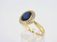 Bague 54 Bague entourage en or avec diamants et saphir 58 Facettes 2142
