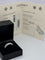 Bague 53 Bague Jonc Chaumet or blanc et saphir vert 58 Facettes 900