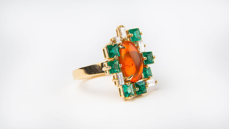 Bague Bague Or Jaune - Opale de Feu 58 Facettes Opale