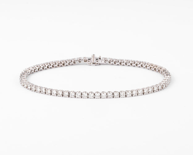 Bracelet Rivière en Or gris orné de diamant 58 Facettes 0