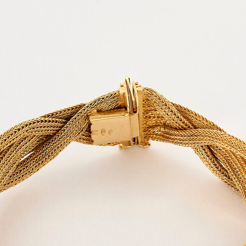 Bracelet Bracelet souple tressé or jaune 58 Facettes ENG10530