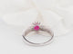 Bague 54 Bague entourage en or blanc, rubis et diamants 58 Facettes 33066