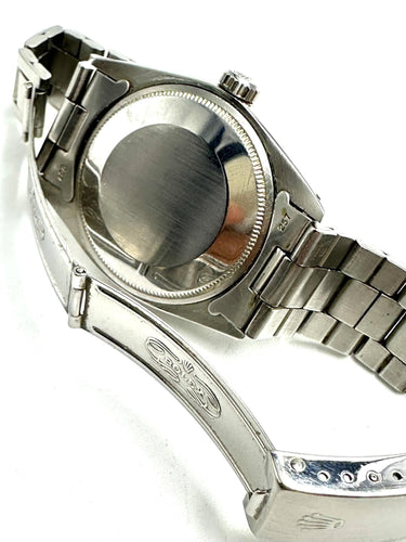 Montre ROLEX - Date réf. 1500 verre plexi 58 Facettes