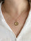 Pendentif Médaille amour Augis ronde Plus hier Moins que demain or jaune rubis 58 Facettes 1140.4