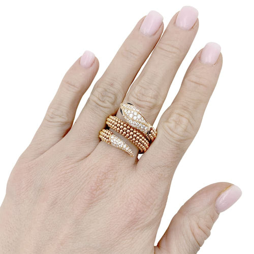 Bague 56 Bague Bulgari, "Serpenti" or rose, diamants et onyx. 58 Facettes 35177