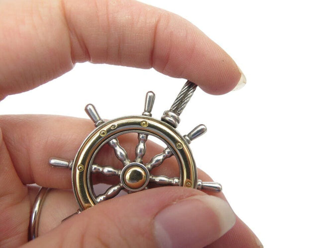 Pendentif rare vintage pendentif HERMES barre a roue en argent 800 & or jaune 18k 24.8 gr 58 Facettes 268491