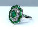 Bague Bague marguerite en or blanc 18 carats en émeraudes et diamants 58 Facettes AB216