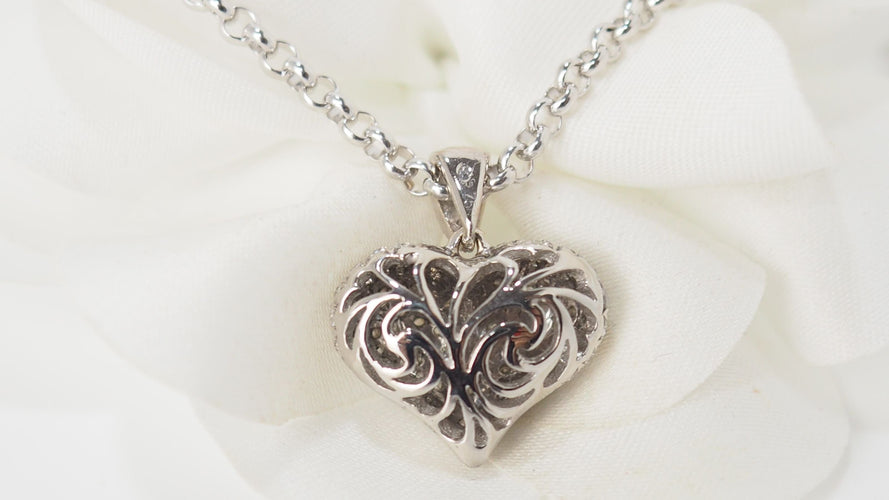 Collier Collier pendentif coeur en or blanc et diamants 58 Facettes 31370
