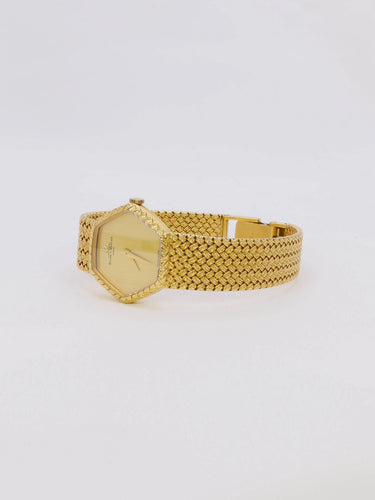 Montre BAUME & MERCIER - Montre vintage or jaune maille tressée 58 Facettes 1067.3