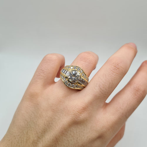Bague or jaune, diamants ronds et diamants baguettes
