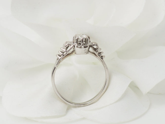 Bague 53.5 Bague solitaire en or blanc et platine, diamant 0,23ct 58 Facettes 33120