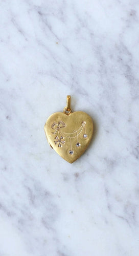 Pendentif Médaillon cœur ouvrant en or, diamants, et perles 58 Facettes