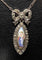Collier Pendentif et sa chaine en argent : enfant sur email et pierres blanches. Vers 1900 58 Facettes AB386