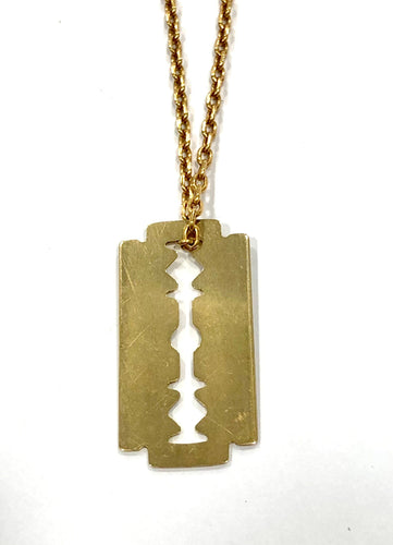 Pendentif Pendentif DINH VAN lame de rasoir or jaune 58 Facettes