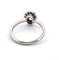 Bague 54 Bague en or blanc avec un diamant ovale au centre et des diamants brillants tout autour. 58 Facettes