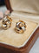 Boucles d'oreilles Boucles d'oreilles nœuds or jaune et blanc 58 Facettes 653