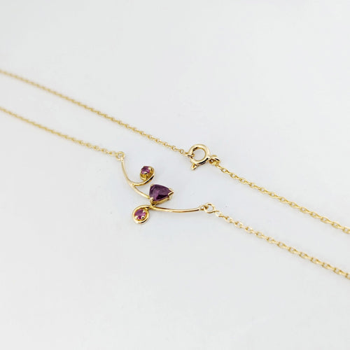 Collier Collier en or jaune  et rubis 58 Facettes 32891