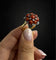 Bague 55 Bague de style baroque, corail et diamants 58 Facettes