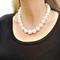 Collier Collier de perles, or blanc et diamants. 58 Facettes 34084