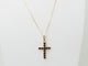 Collier Collier pendentif croix en or jaune et grenats 58 Facettes 33126