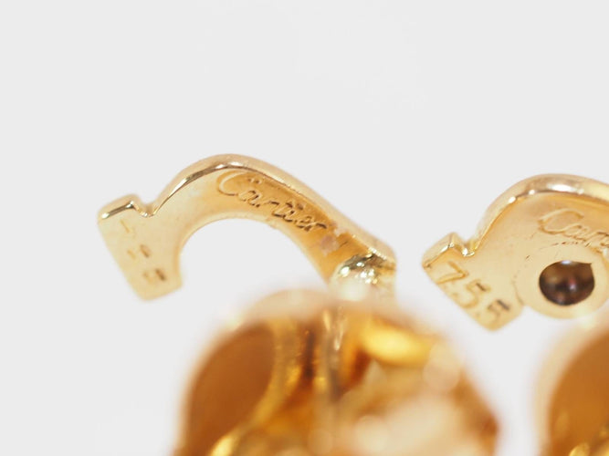 Boucles d'oreilles Boucles d'oreilles Puces Cartier C en or jaune et diamants 58 Facettes 33295
